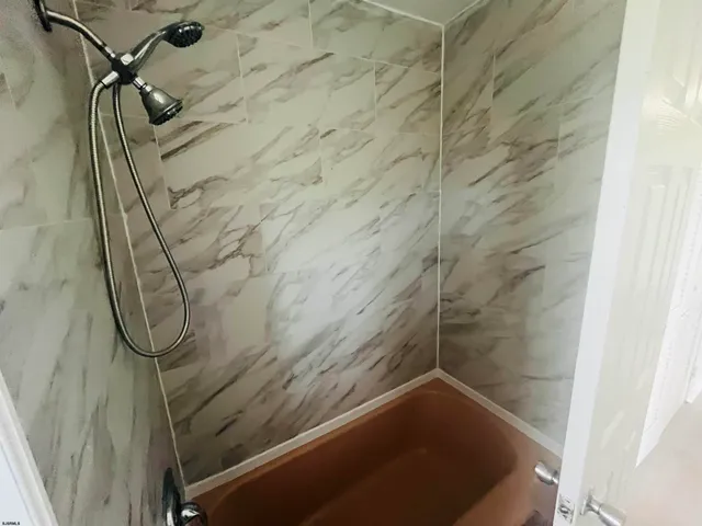 a bathroom with a sink and a bathtub