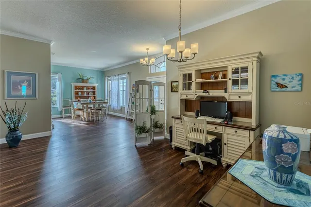 an aerial view of a house with a garden