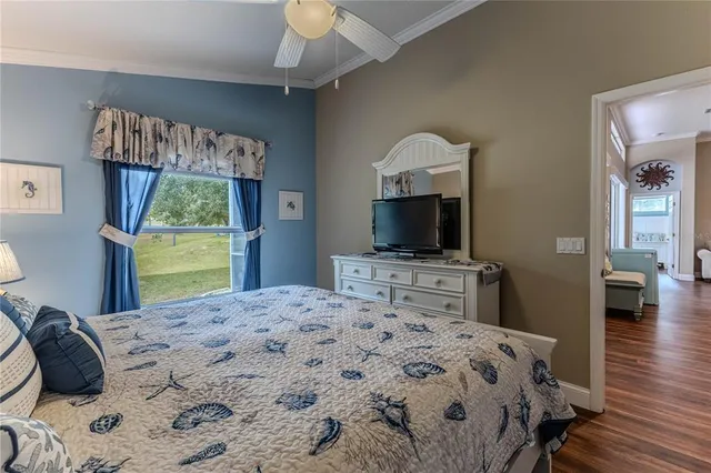 a view of a patio with couches table and chairs and potted plants