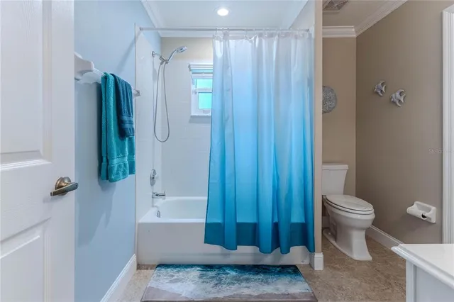 an aerial view of a house with outdoor space