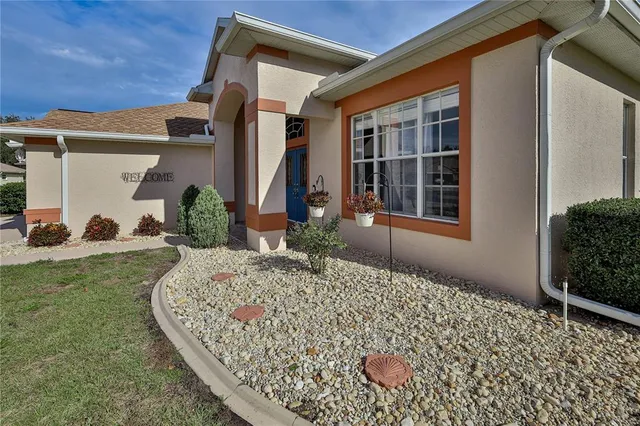 a dining room with furniture wooden floor and window