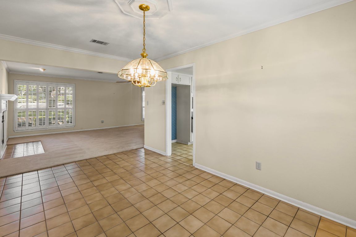 415 Dasher Drive Lakeway, TX 78734 - Photo 12 of 38 a view of an empty room and window