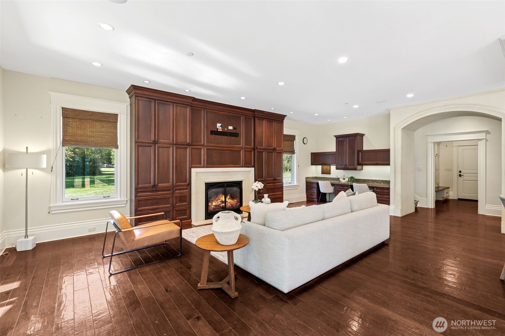 22029 238th Place Southeast Maple Valley, WA 98038 - Photo 18 of 40 a living room with furniture and a fireplace