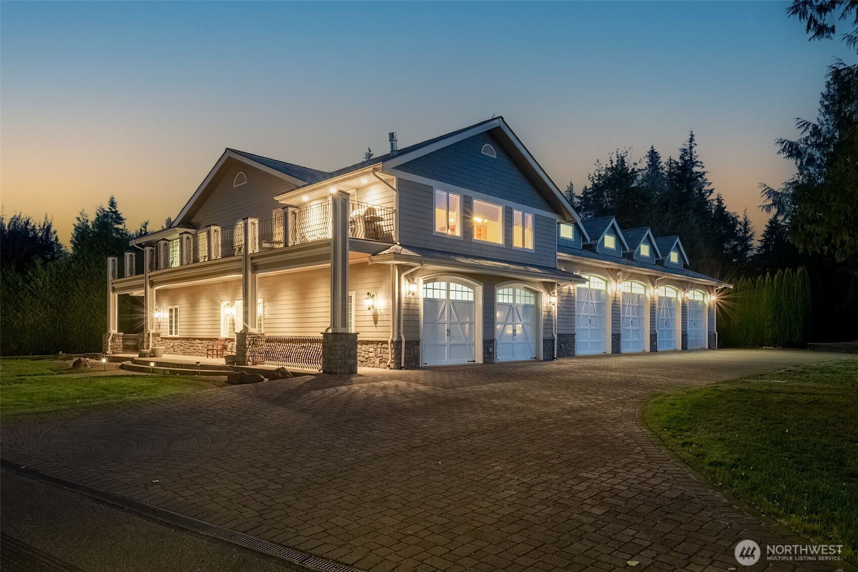 22029 238th Place Southeast Maple Valley, WA 98038 - Photo 2 of 40 a front view of a house with a yard