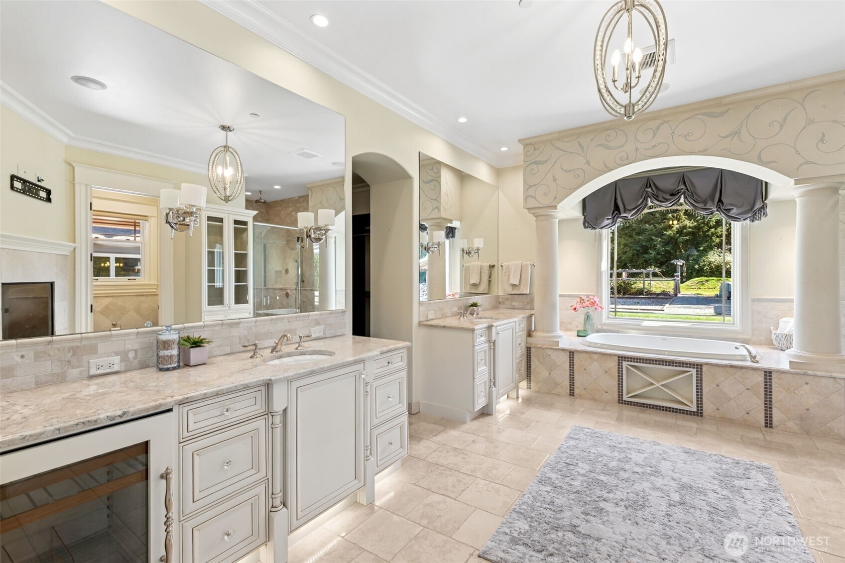 22029 238th Place Southeast Maple Valley, WA 98038 - Photo 21 of 40 a spacious bathroom with a sink a mirror and a bathtub