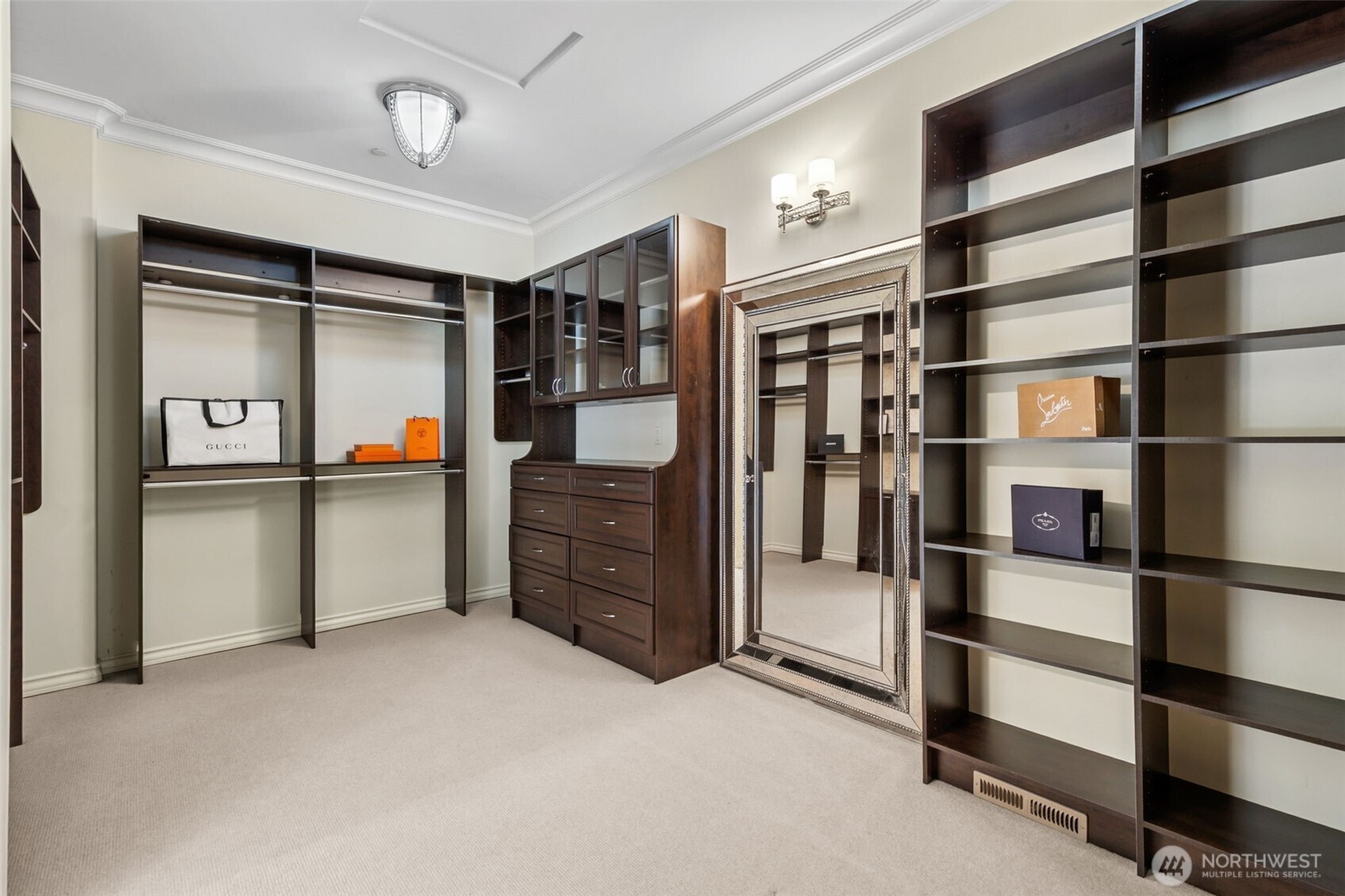 22029 238th Place Southeast Maple Valley, WA 98038 - Photo 23 of 40 a view of walk in closet with clothes and shoes