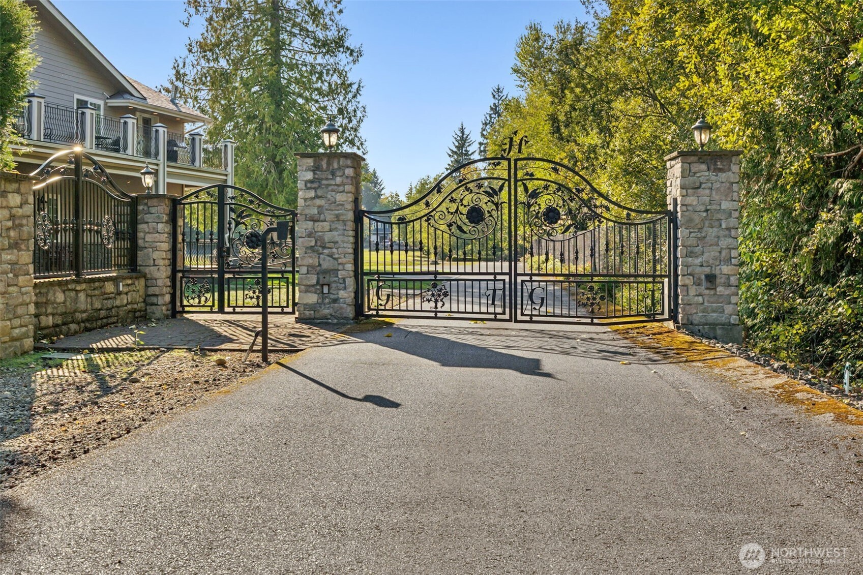 22029 238th Place Southeast Maple Valley, WA 98038 - Photo 3 of 40 a view of a house with a street