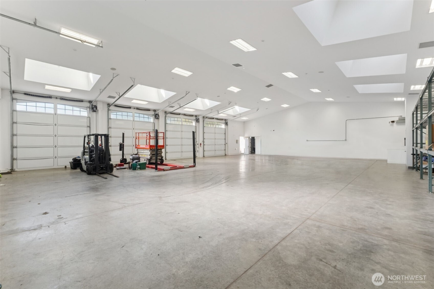 22029 238th Place Southeast Maple Valley, WA 98038 - Photo 40 of 40 a view of a room with gym equipment
