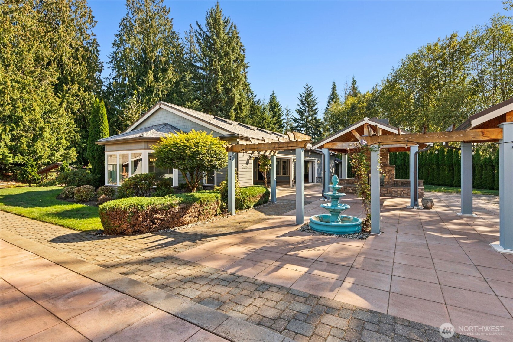 22029 238th Place Southeast Maple Valley, WA 98038 - Photo 9 of 40 a front view of a house with garden