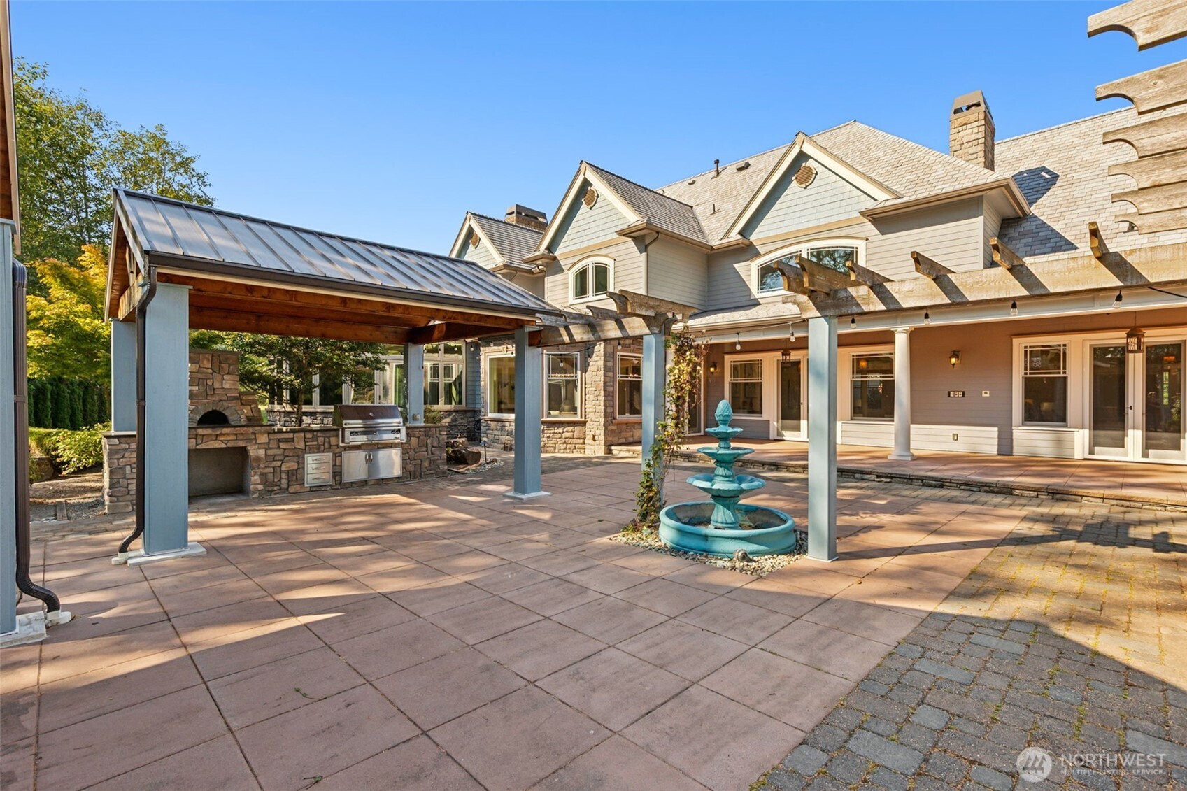 22029 238th Place Southeast Maple Valley, WA 98038 - Photo 10 of 40 a front view of a house with a garden