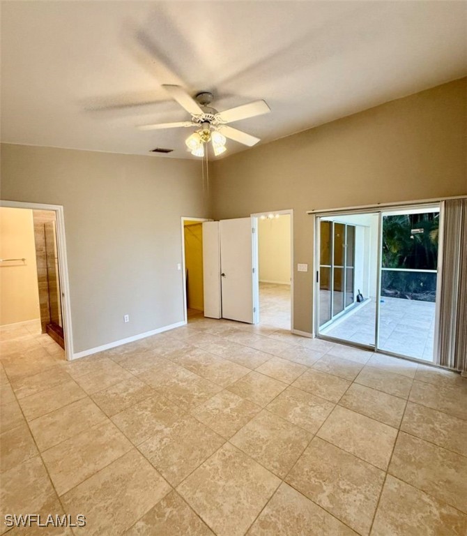 5013 Southwest 16th Place Cape Coral, FL 33914 - Photo 11 of 50 a view of an empty room with glass door