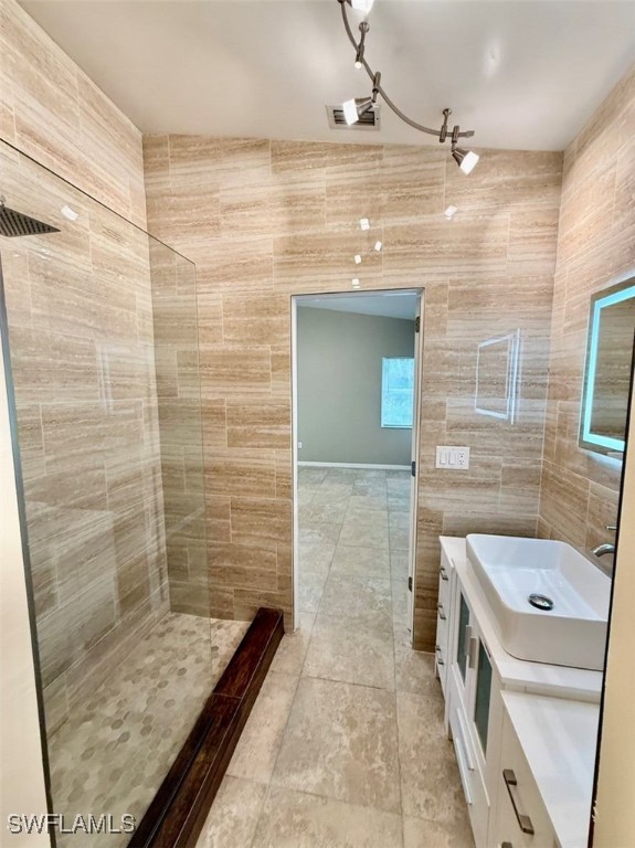 5013 Southwest 16th Place Cape Coral, FL 33914 - Photo 15 of 50 a bathroom with a tub a sink and shower