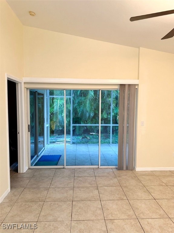 5013 Southwest 16th Place Cape Coral, FL 33914 - Photo 28 of 50 a view of backyard and floor to ceiling window
