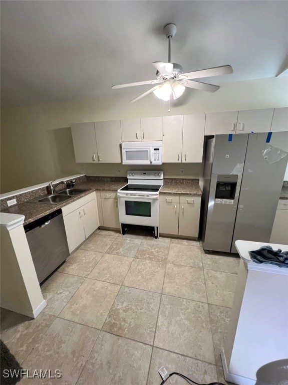 5013 Southwest 16th Place Cape Coral, FL 33914 - Photo 3 of 50 a kitchen with stainless steel appliances granite countertop a sink and cabinets