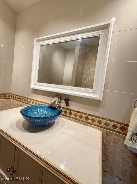 5013 Southwest 16th Place Cape Coral, FL 33914 - Photo 33 of 50 a bathroom with a sink and a mirror