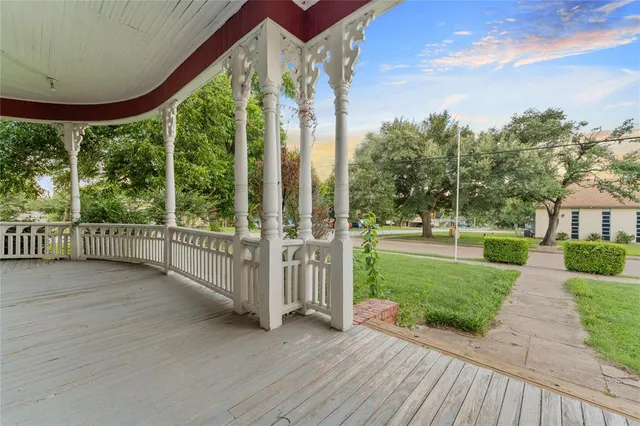a view of a porch with a backyard