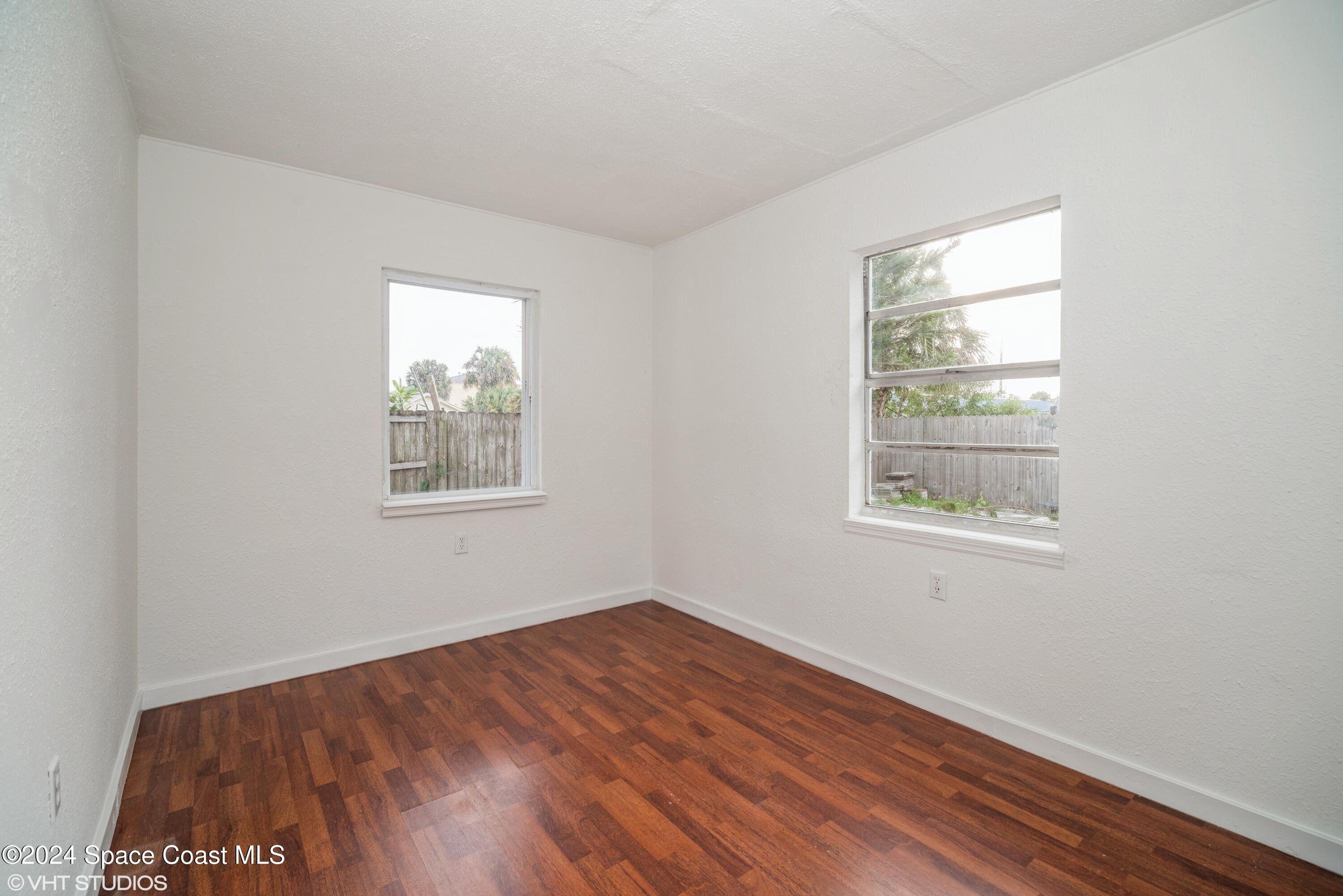 2154 Henry Street Northeast Palm Bay, FL 32905 - Photo 11 of 20 11_2154HenryStNE_18_Bedroom_HiRes