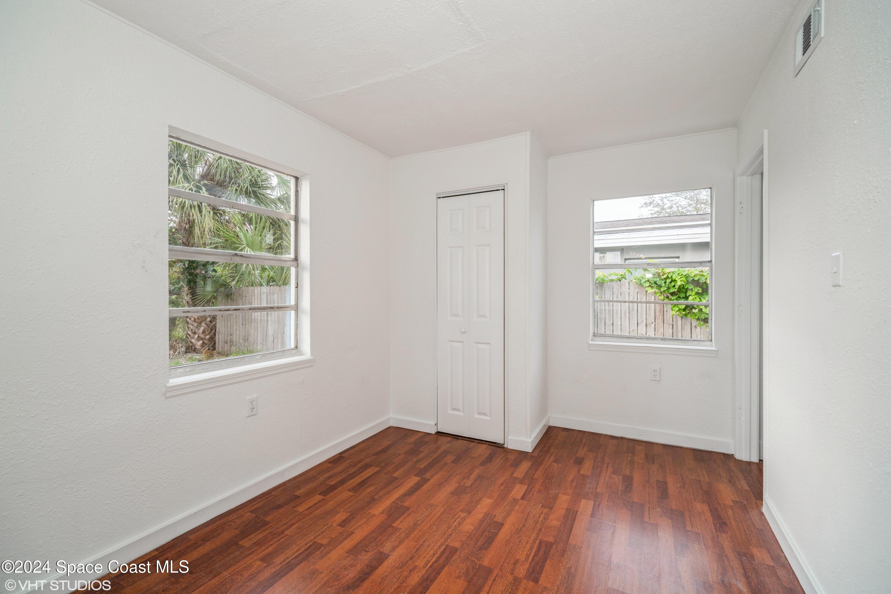 2154 Henry Street Northeast Palm Bay, FL 32905 - Photo 12 of 20 12_2154HenryStNE_18001_Bedroom_HiRes