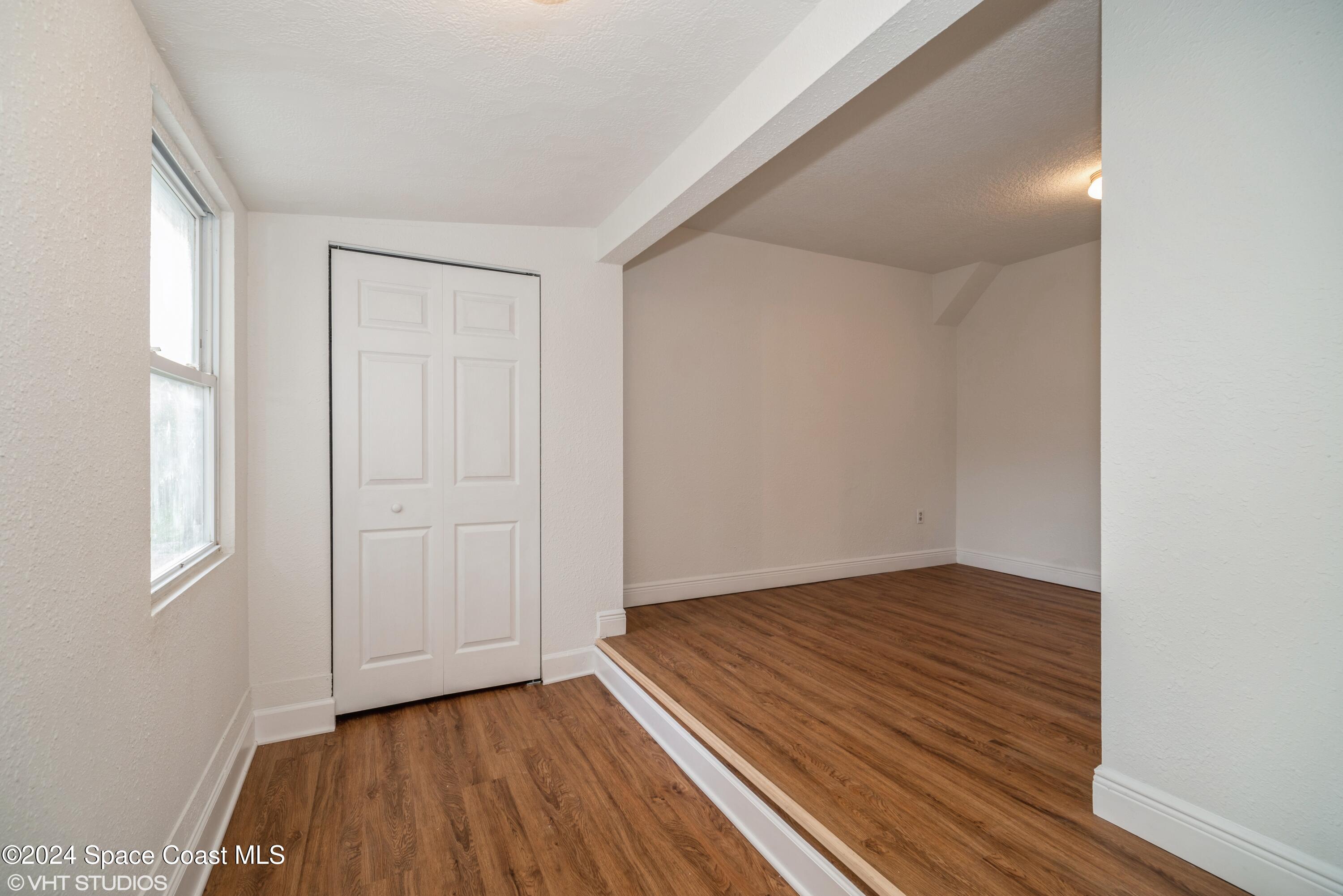 2154 Henry Street Northeast Palm Bay, FL 32905 - Photo 16 of 20 16_2154HenryStNE_154001_3rdBedroom_HiRes