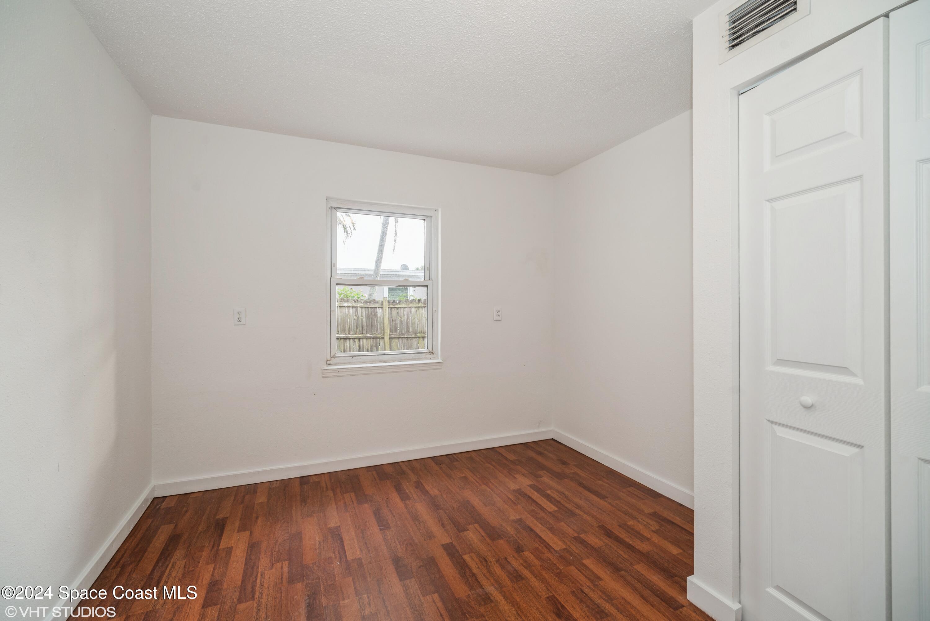 2154 Henry Street Northeast Palm Bay, FL 32905 - Photo 17 of 20 17_2154HenryStNE_161_4thBedroom_HiRes