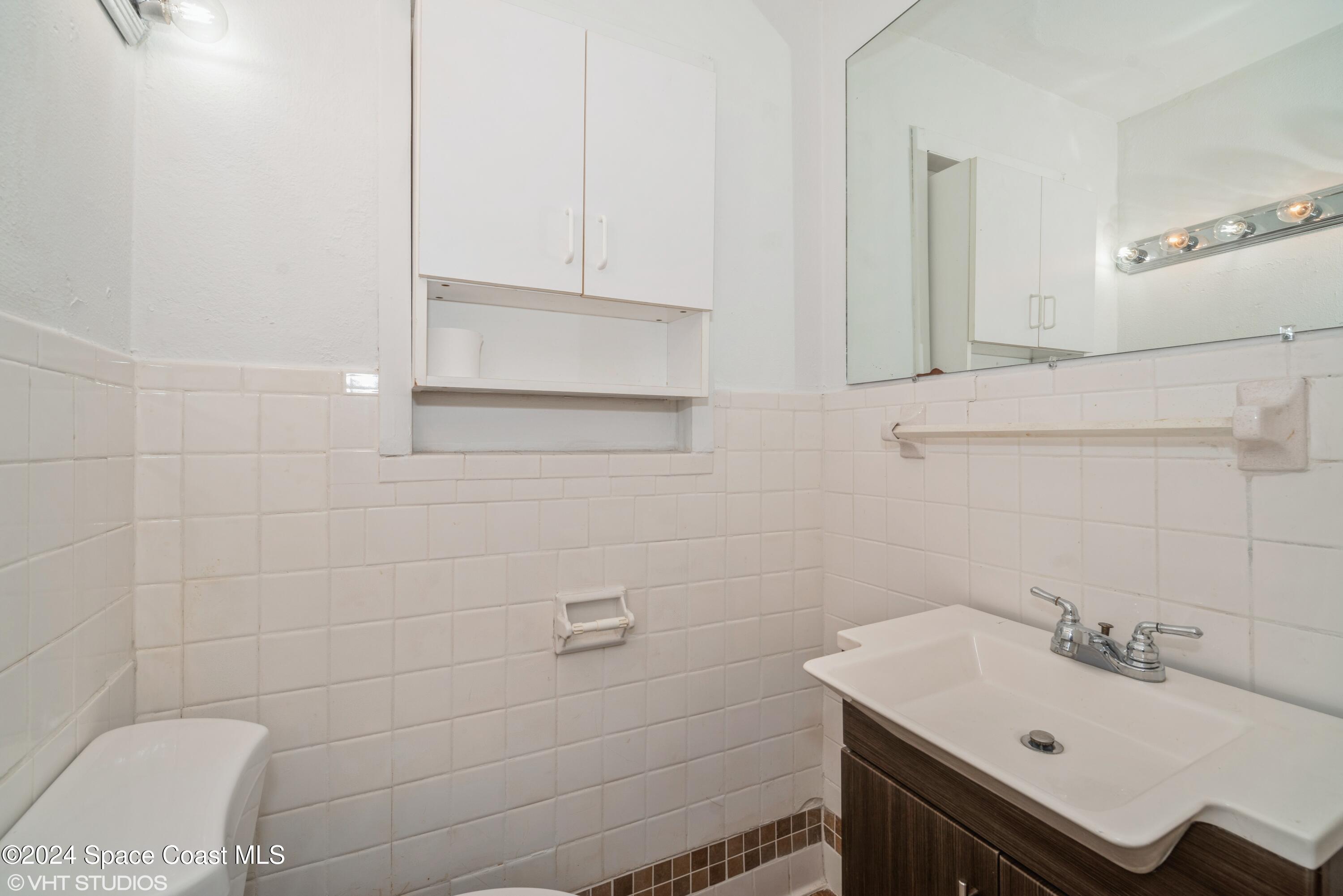 2154 Henry Street Northeast Palm Bay, FL 32905 - Photo 19 of 20 19_2154HenryStNE_8_Bathroom_HiRes