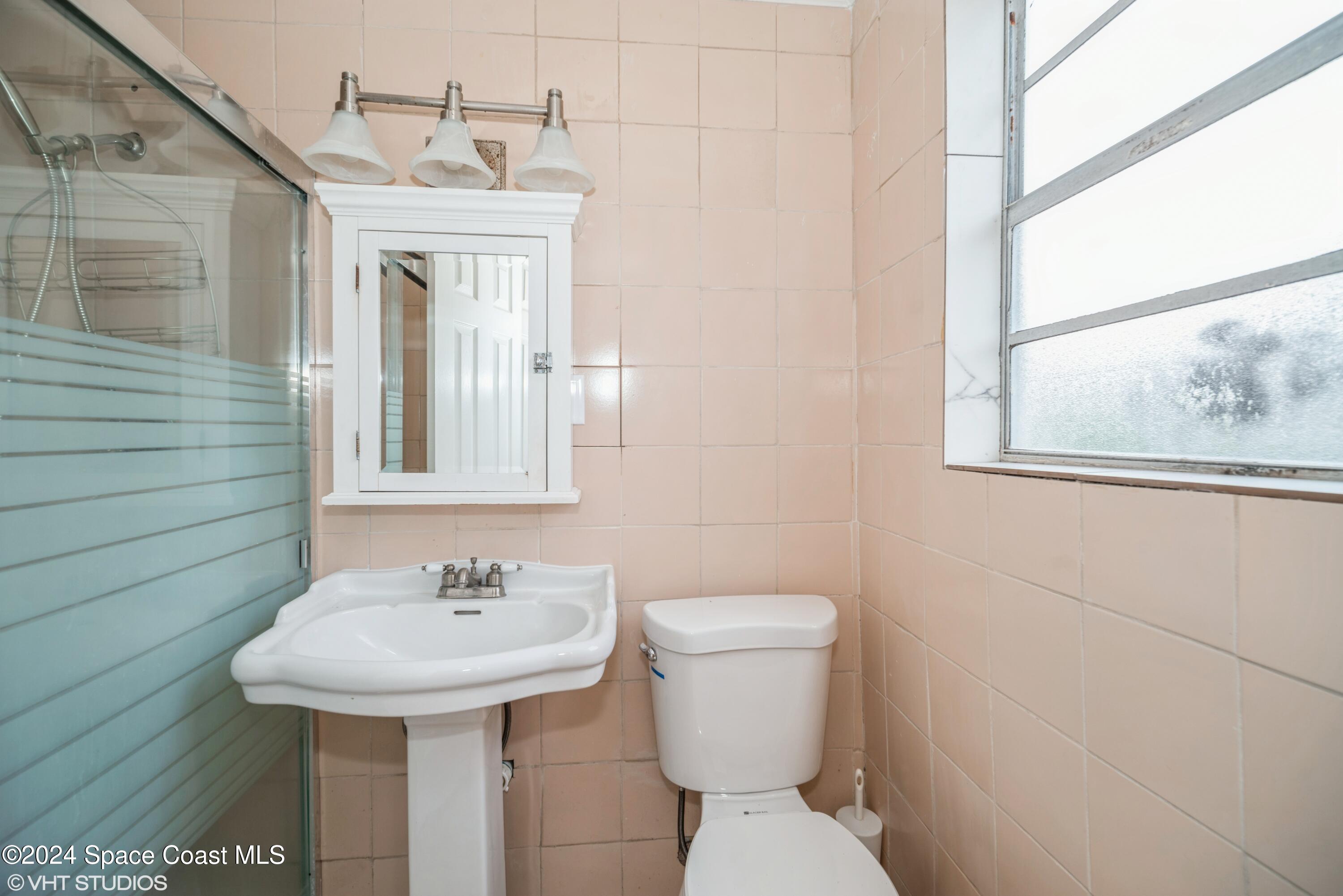 2154 Henry Street Northeast Palm Bay, FL 32905 - Photo 20 of 20 20_2154HenryStNE_9_2ndBathroom_HiRes