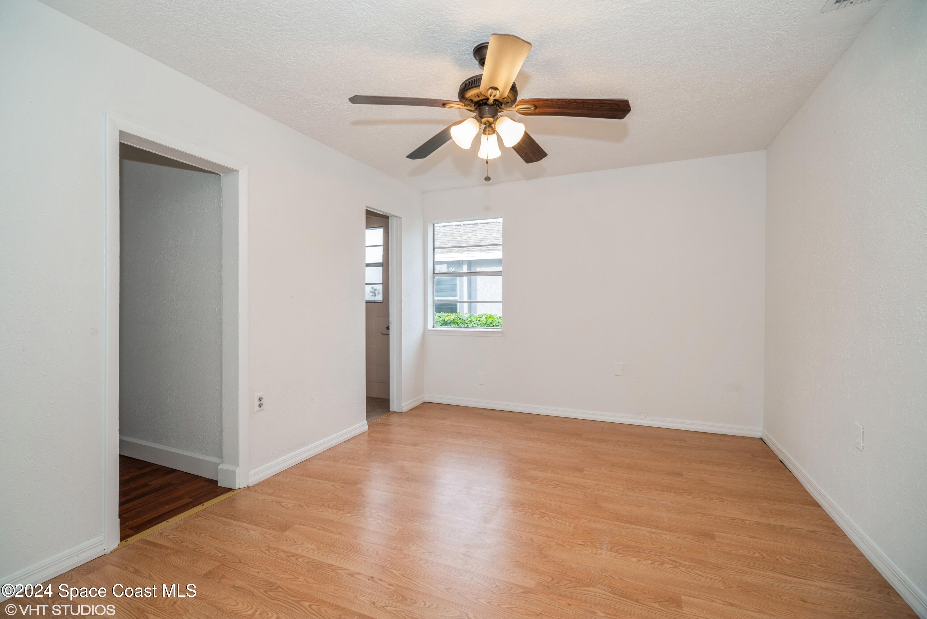 2154 Henry Street Northeast Palm Bay, FL 32905 - Photo 8 of 20 08_2154HenryStNE_3_FamilyRoom_HiRes