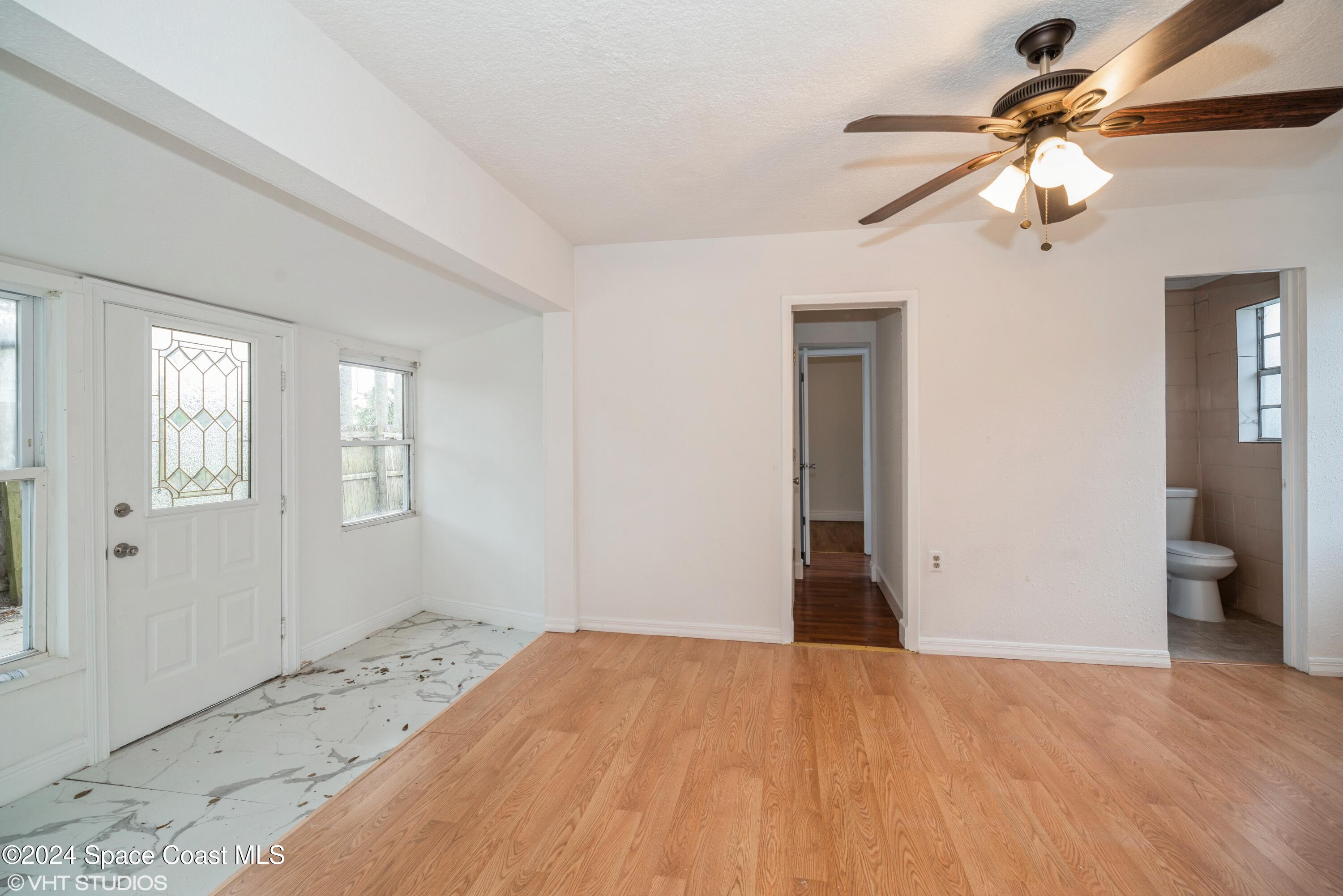 2154 Henry Street Northeast Palm Bay, FL 32905 - Photo 10 of 20 10_2154HenryStNE_3002_FamilyRoom_HiRes