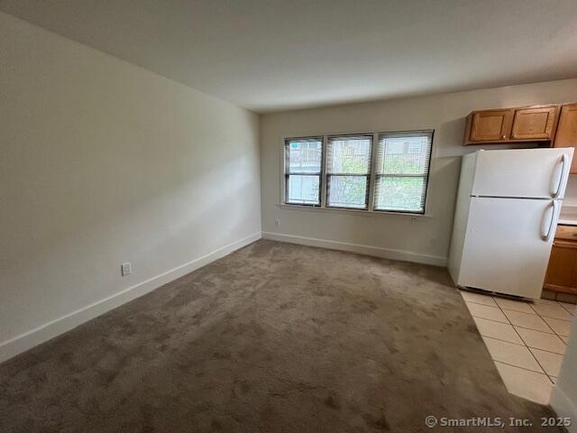 34 Prospect Street, Unit 4H Norwalk, CT 06850 - Photo 7 of 8 an empty room with windows