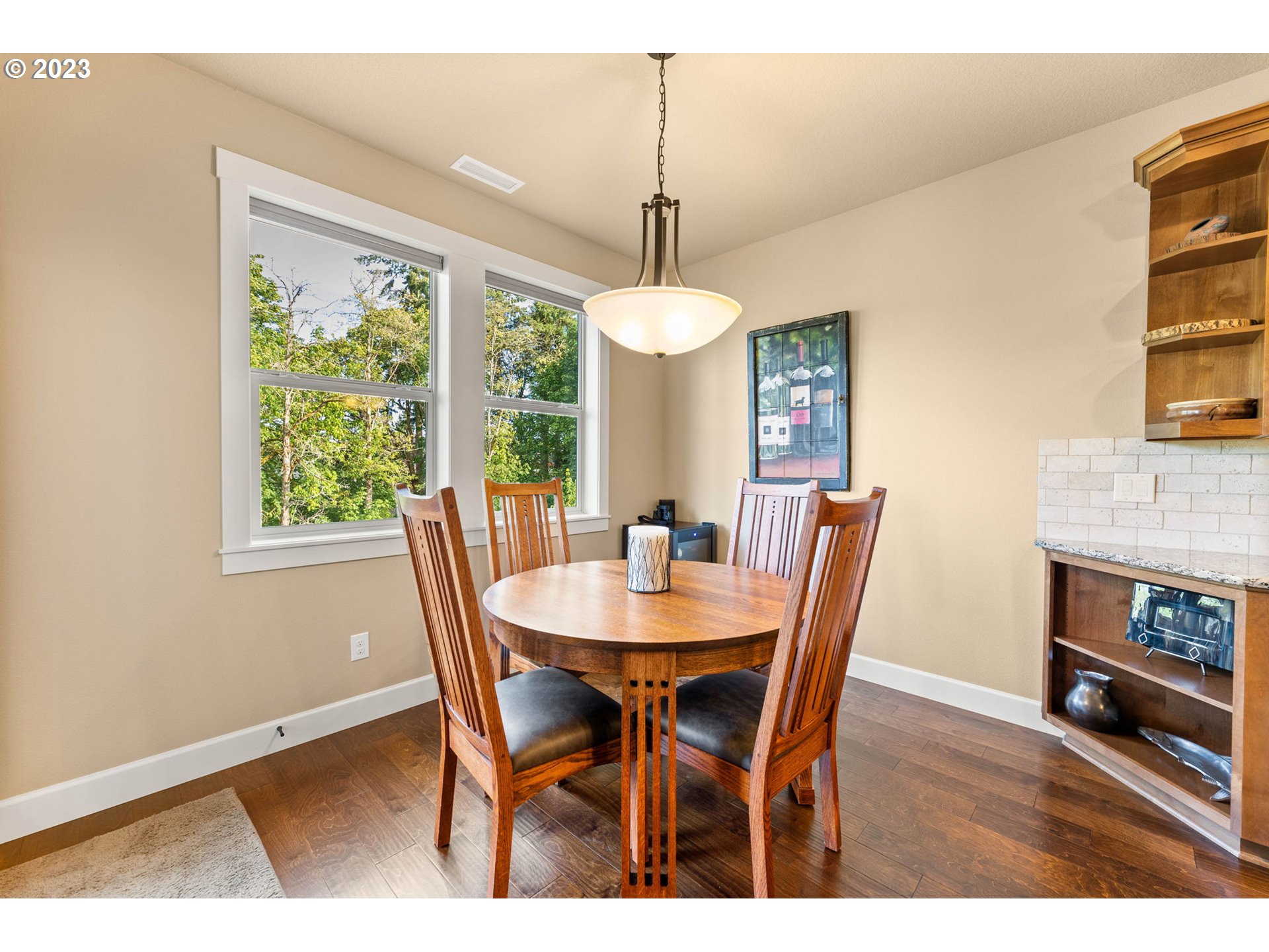 1845 South Harrier Road Ridgefield, WA 98642 - Photo 16 of 28 a dining room with furniture window and wooden floor