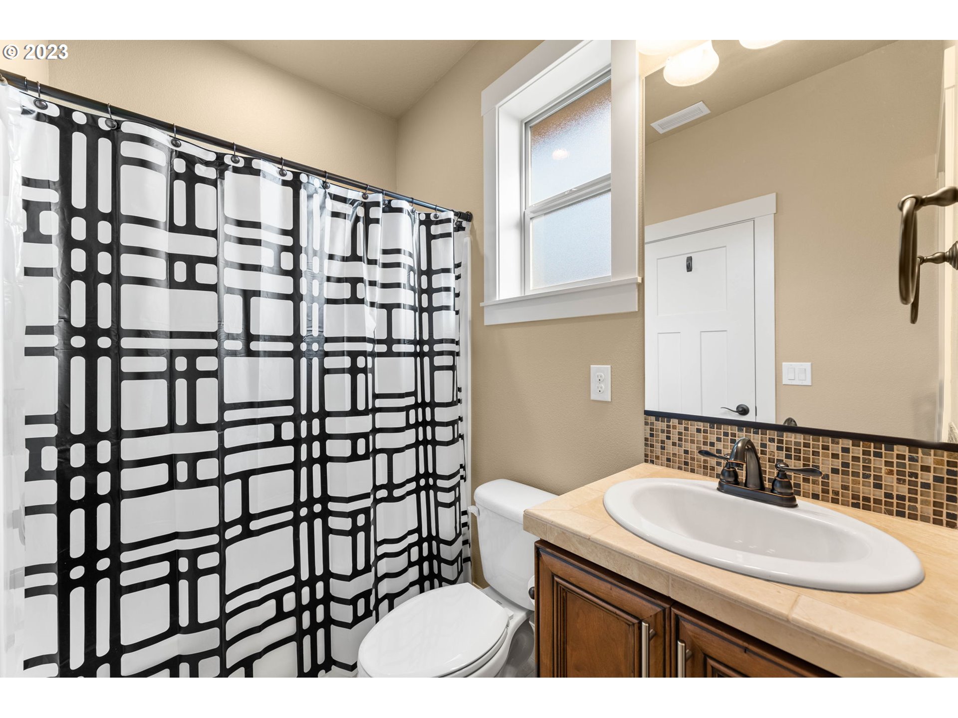 1845 South Harrier Road Ridgefield, WA 98642 - Photo 20 of 28 a bathroom with a sink a toilet and shower