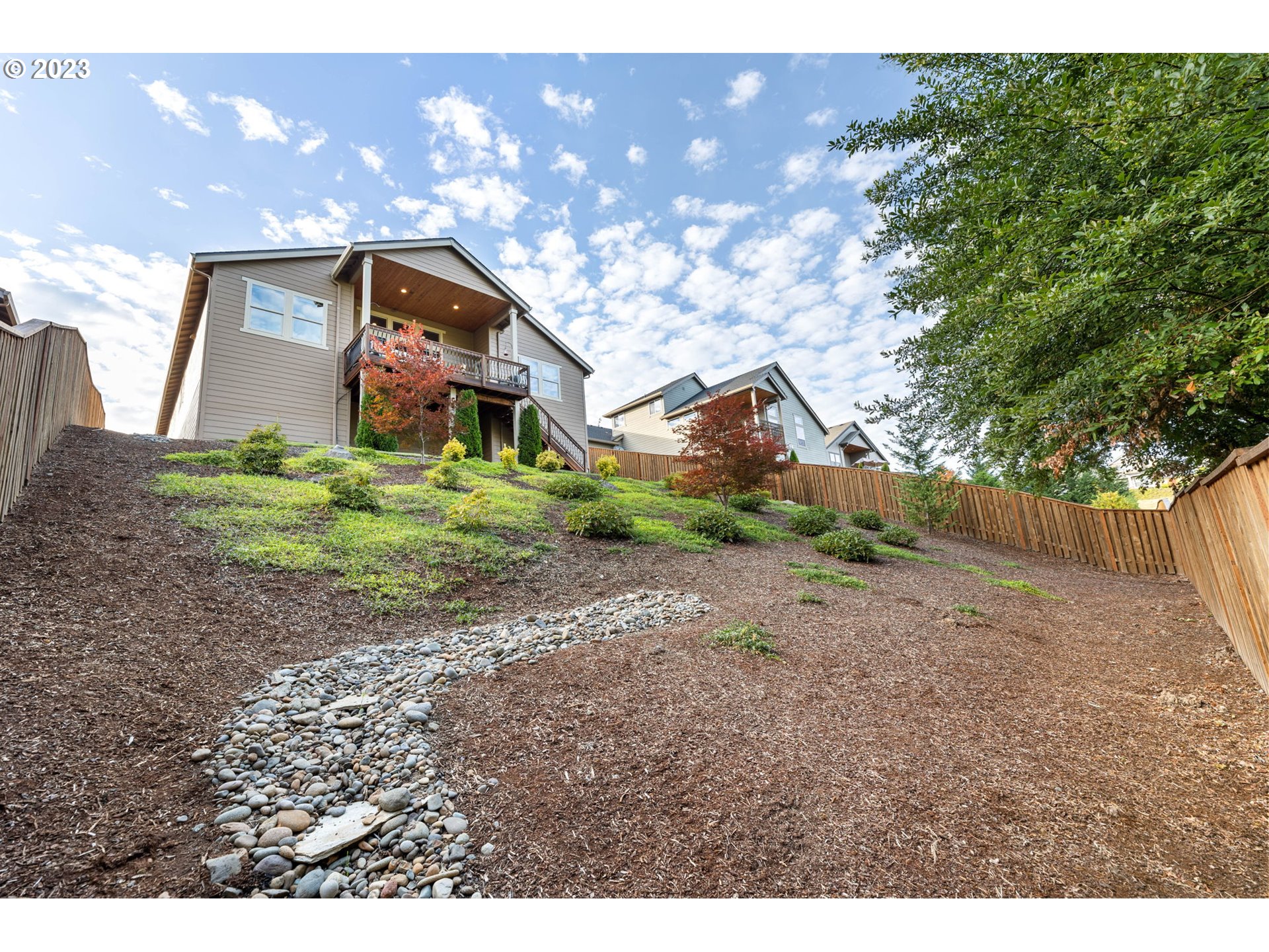 1845 South Harrier Road Ridgefield, WA 98642 - Photo 27 of 28 a front view of a house with a yard and garage