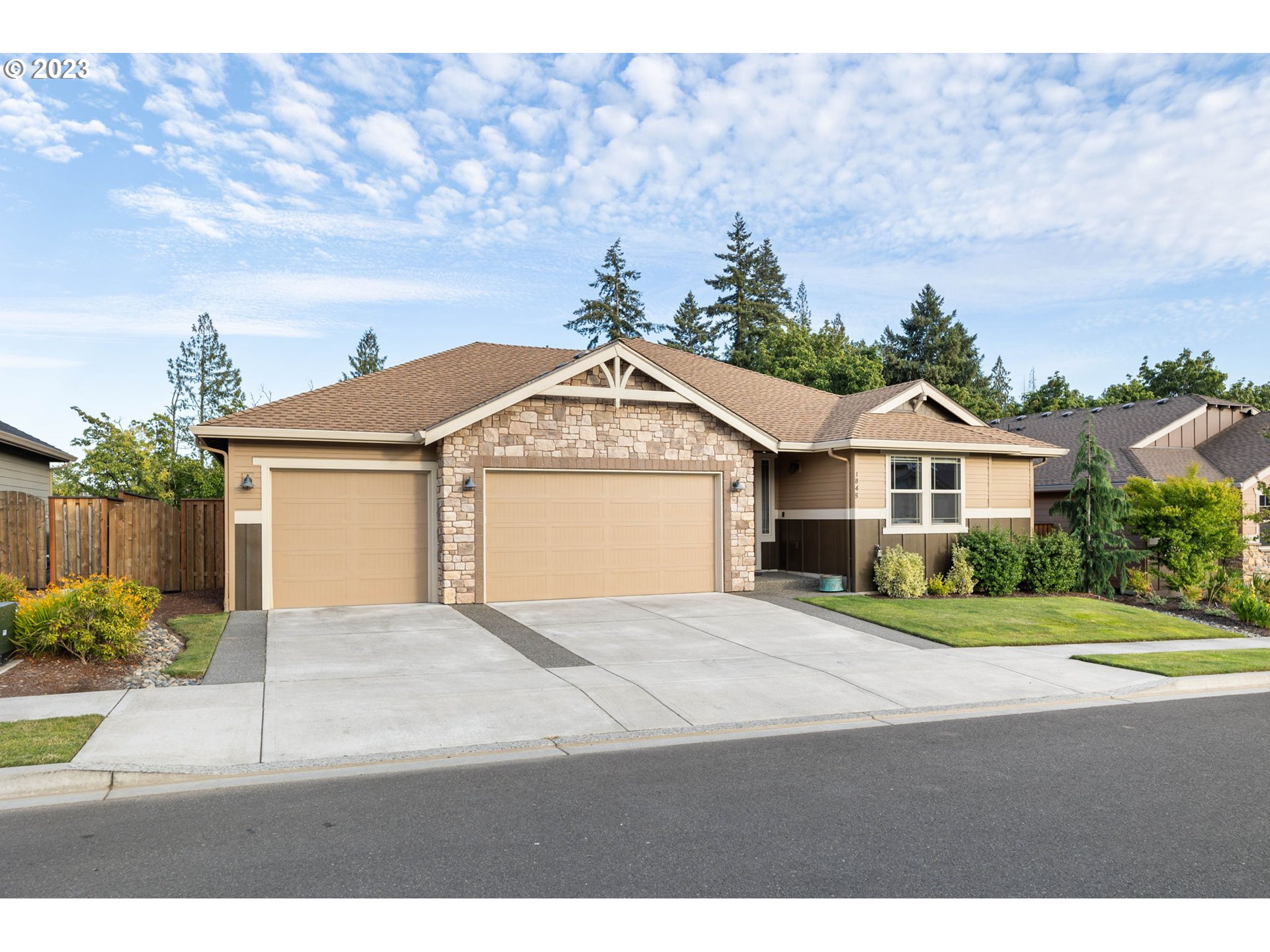 1845 South Harrier Road Ridgefield, WA 98642 - Photo 28 of 28 a front view of a house with a yard and garage
