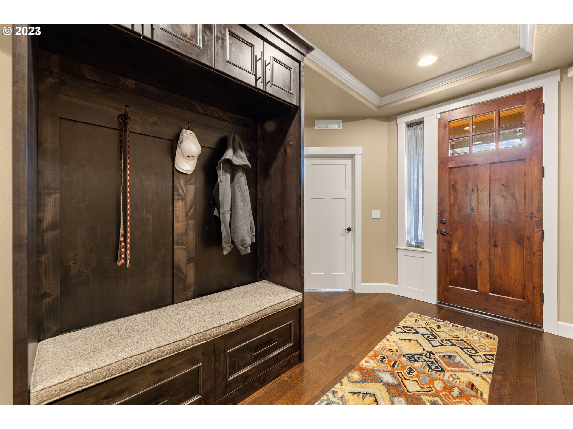 1845 South Harrier Road Ridgefield, WA 98642 - Photo 3 of 28 a living room with a bed and glass door