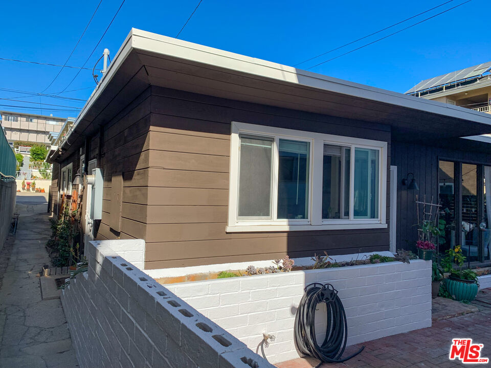 133 Whiting Street El Segundo, CA 90245 - Photo 11 of 14 a house view with a seating space