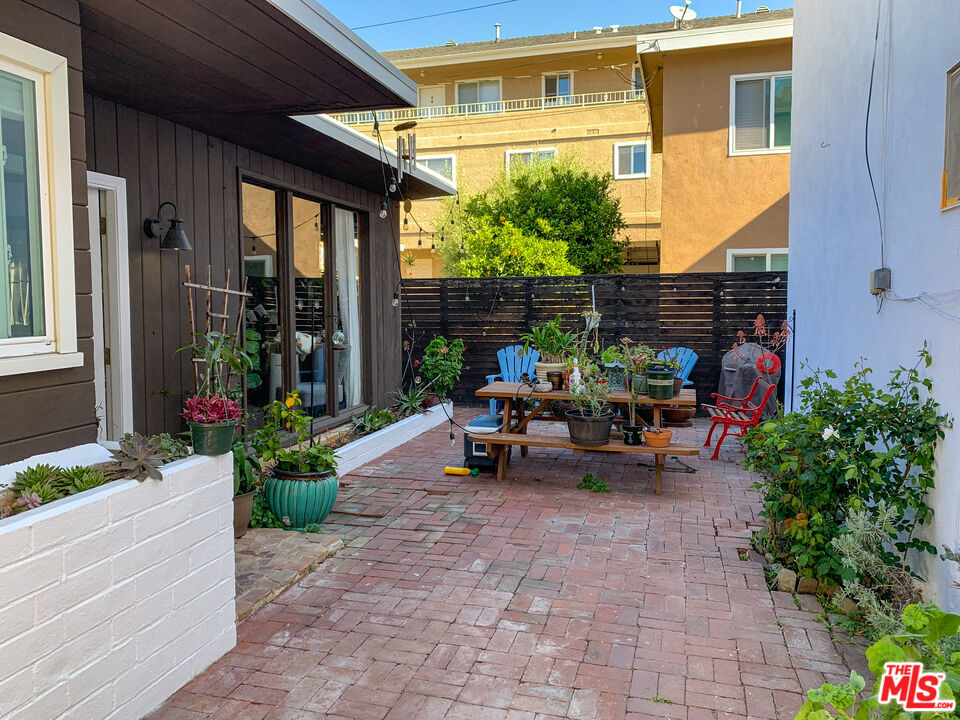 133 Whiting Street El Segundo, CA 90245 - Photo 7 of 14 a view of a lounge chairs in the porch
