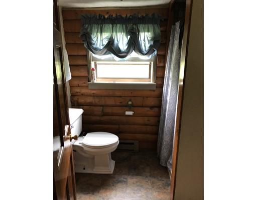 16 Blood Road Charlton, MA 01507 - Photo 20 of 22 a bathroom with a toilet and a sink