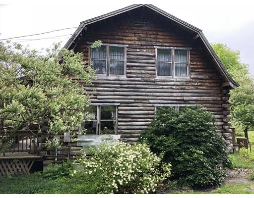 16 Blood Road Charlton, MA 01507 - Photo 2 of 22 a front view of a house with a yard