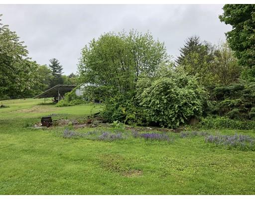 16 Blood Road Charlton, MA 01507 - Photo 3 of 22 a view of a green field with trees