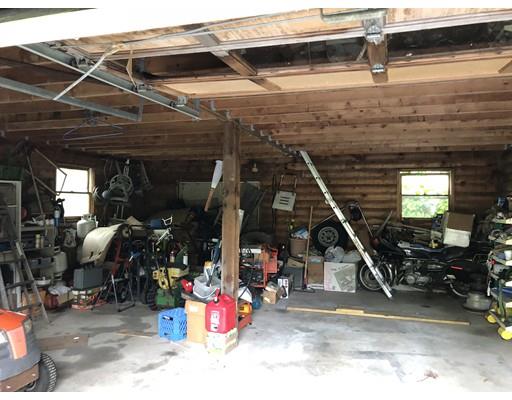 16 Blood Road Charlton, MA 01507 - Photo 10 of 22 a view of a garage with a table and chairs