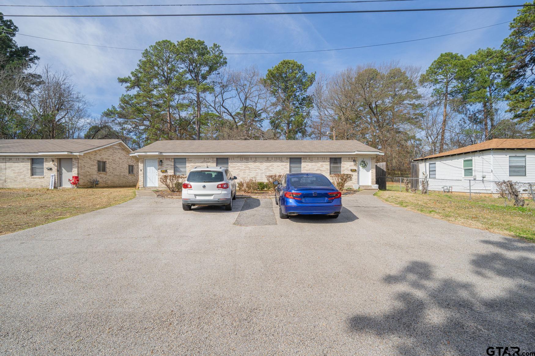 603 Waggoner Street Longview, TX 75604 - Photo 22 of 22 a car parked in front of a building