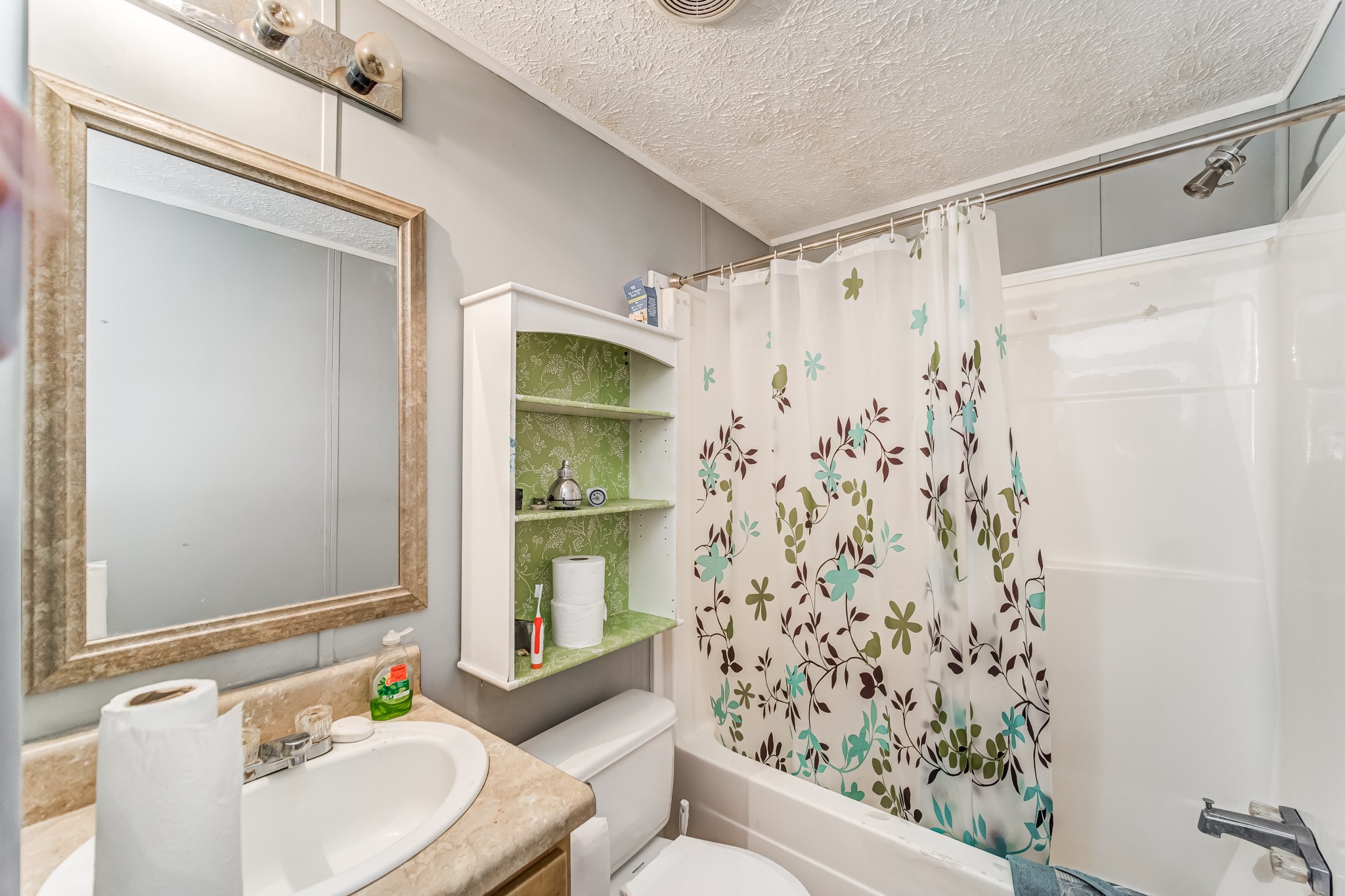 1077 Hamilton Chambers Road Lebanon, TN 37087 - Photo 19 of 29 a bathroom with a sink and a shower