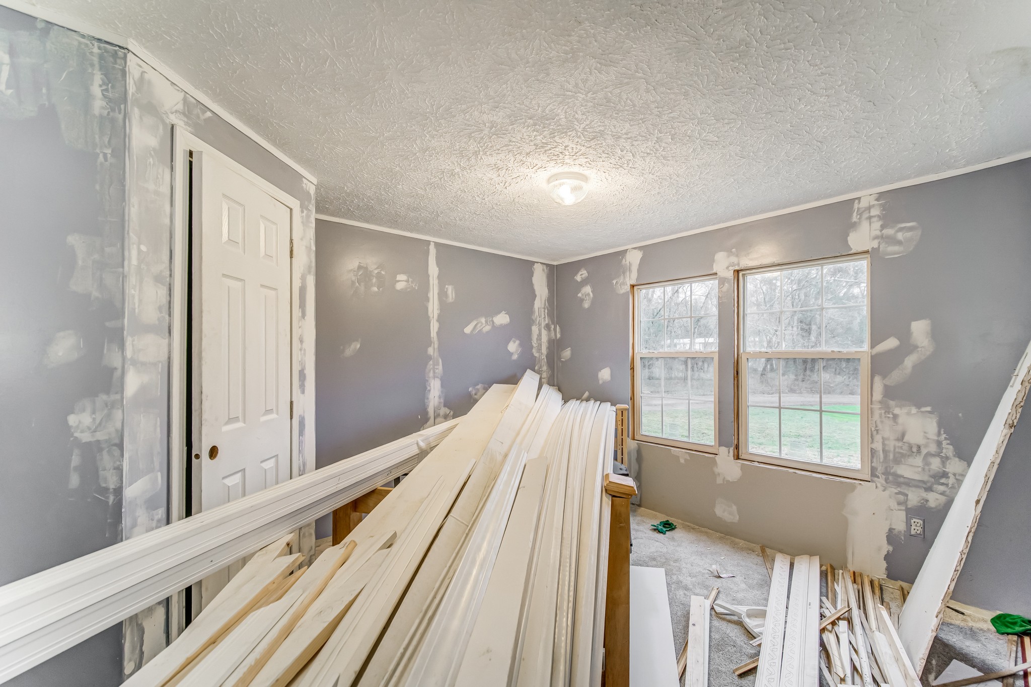 1077 Hamilton Chambers Road Lebanon, TN 37087 - Photo 22 of 29 a spacious bedroom with a bed and a large window