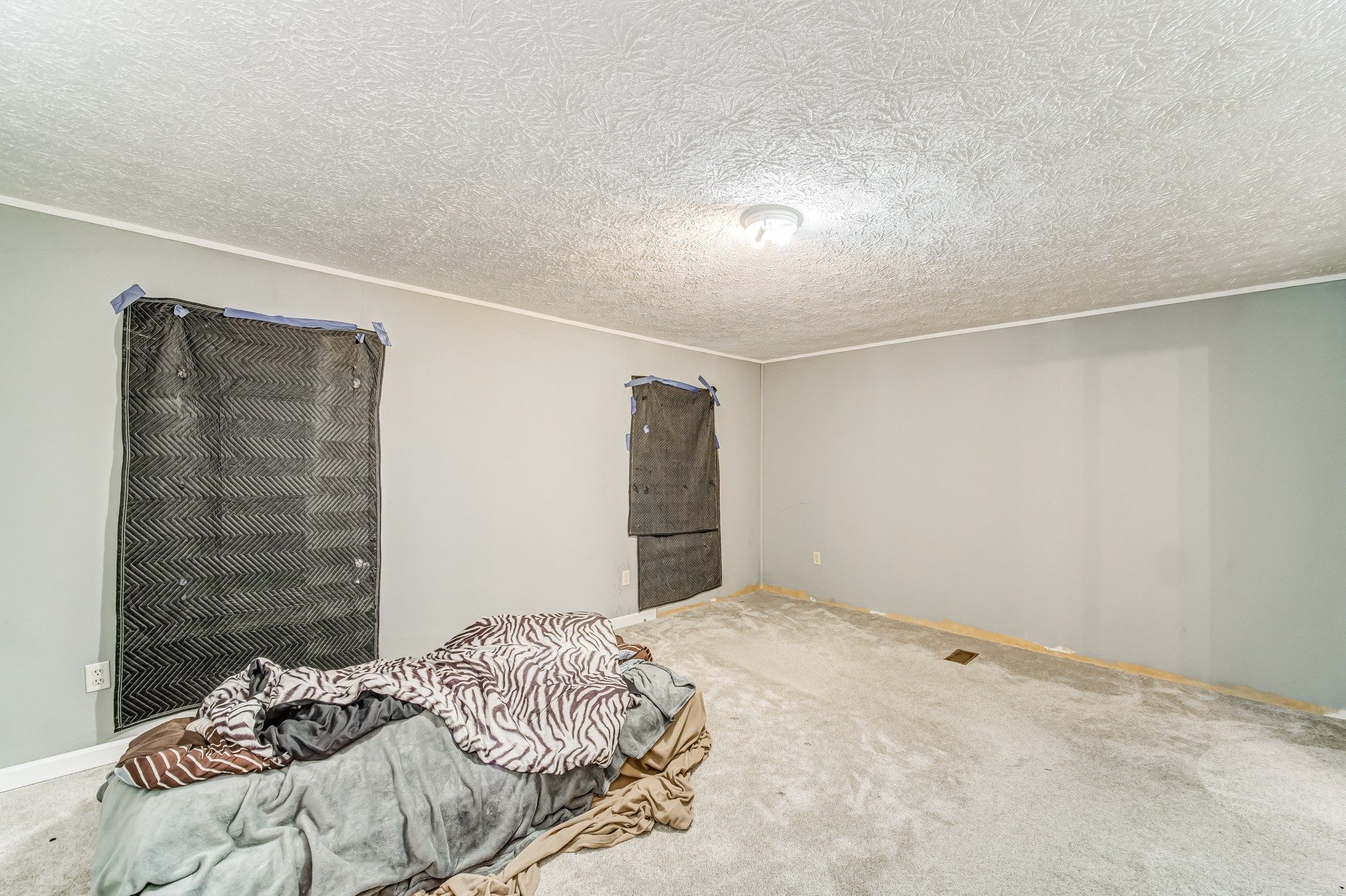 1077 Hamilton Chambers Road Lebanon, TN 37087 - Photo 25 of 29 a bedroom with a bed and a walk in closet