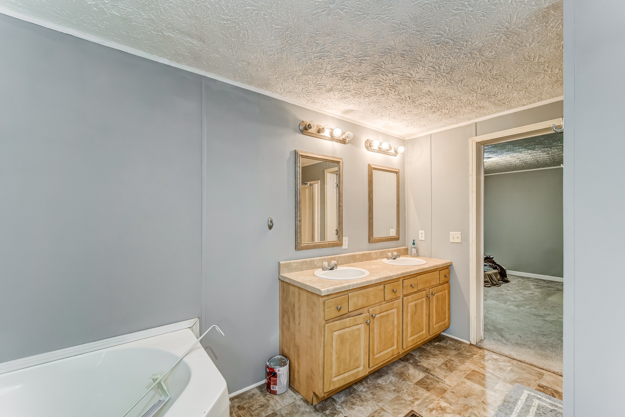 1077 Hamilton Chambers Road Lebanon, TN 37087 - Photo 28 of 29 a bathroom with a sink a toilet and shower