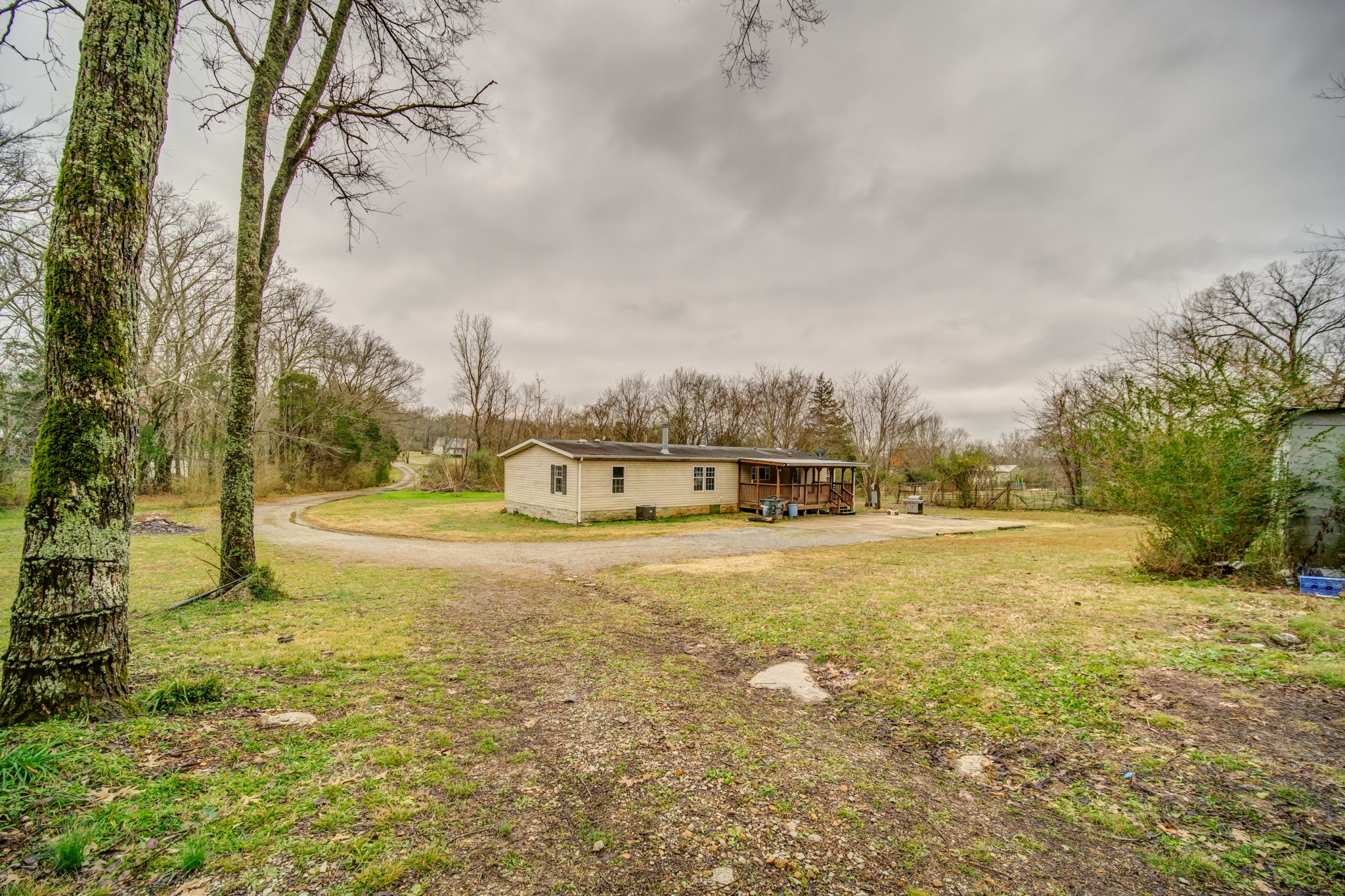 1077 Hamilton Chambers Road Lebanon, TN 37087 - Photo 8 of 29 a view of a large garden with large trees