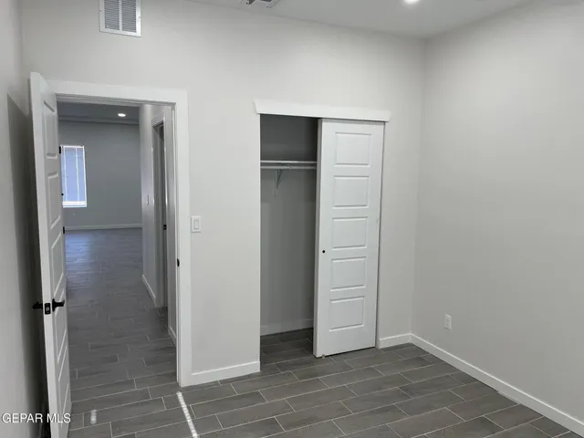 an empty room with closet