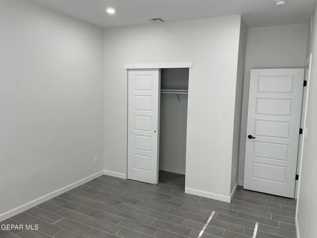 an empty room with closet