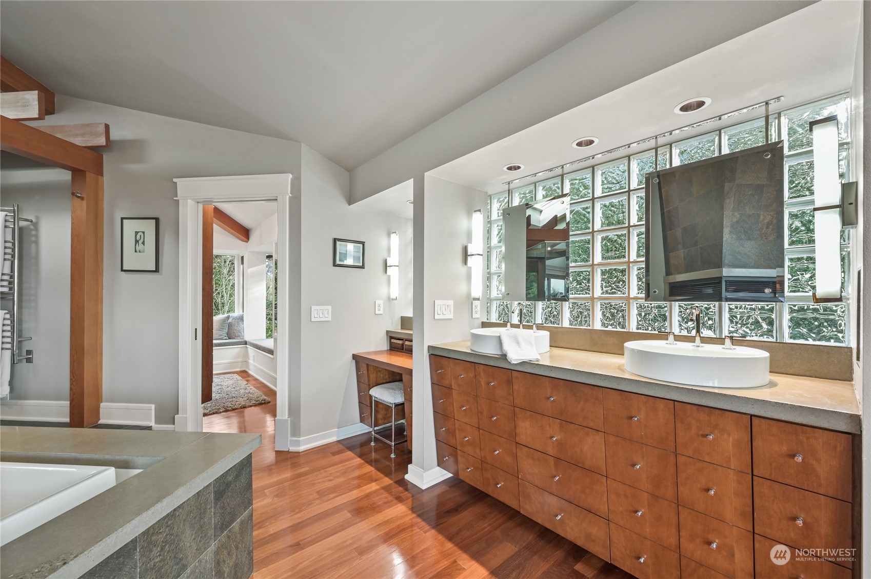 711 Briar Road Bellingham, WA 98225 - Photo 21 of 40 a large bathroom with double vanity and a large mirror
