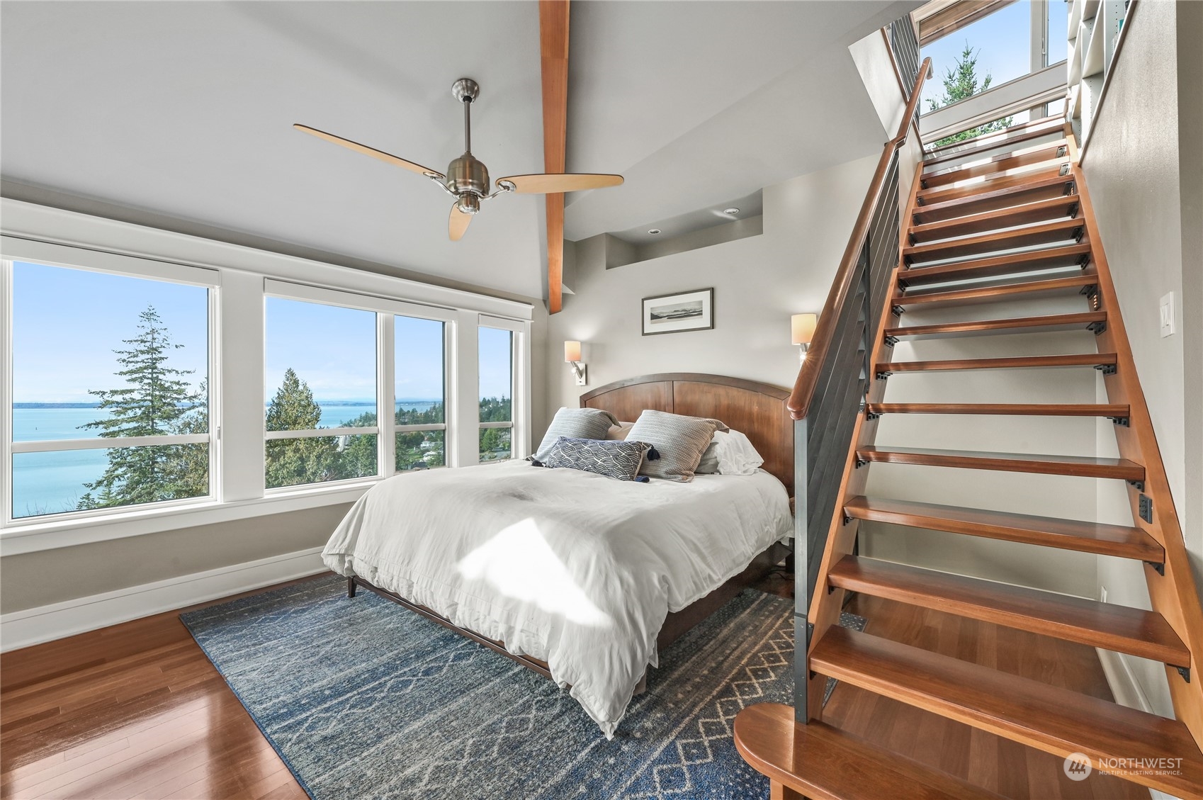 711 Briar Road Bellingham, WA 98225 - Photo 24 of 40 a bed sitting in a bedroom next to a window